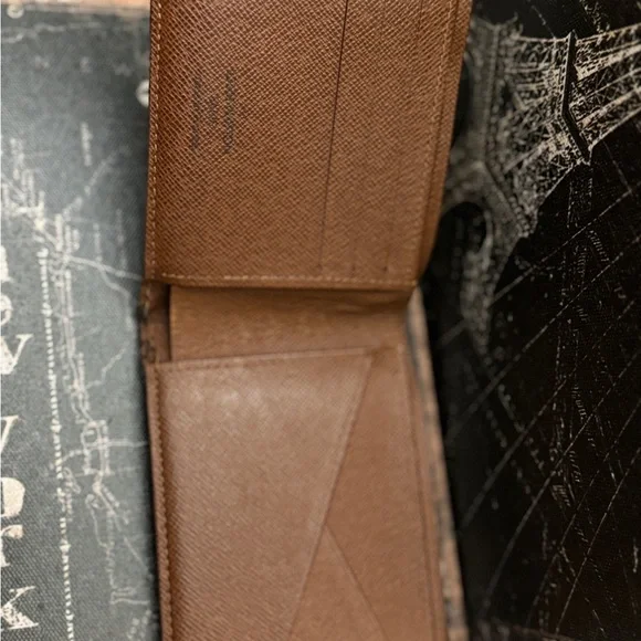 Louis Vuitton men’s multiple monogram wallet.